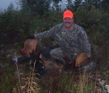 Derek Astrike with Maine Moose